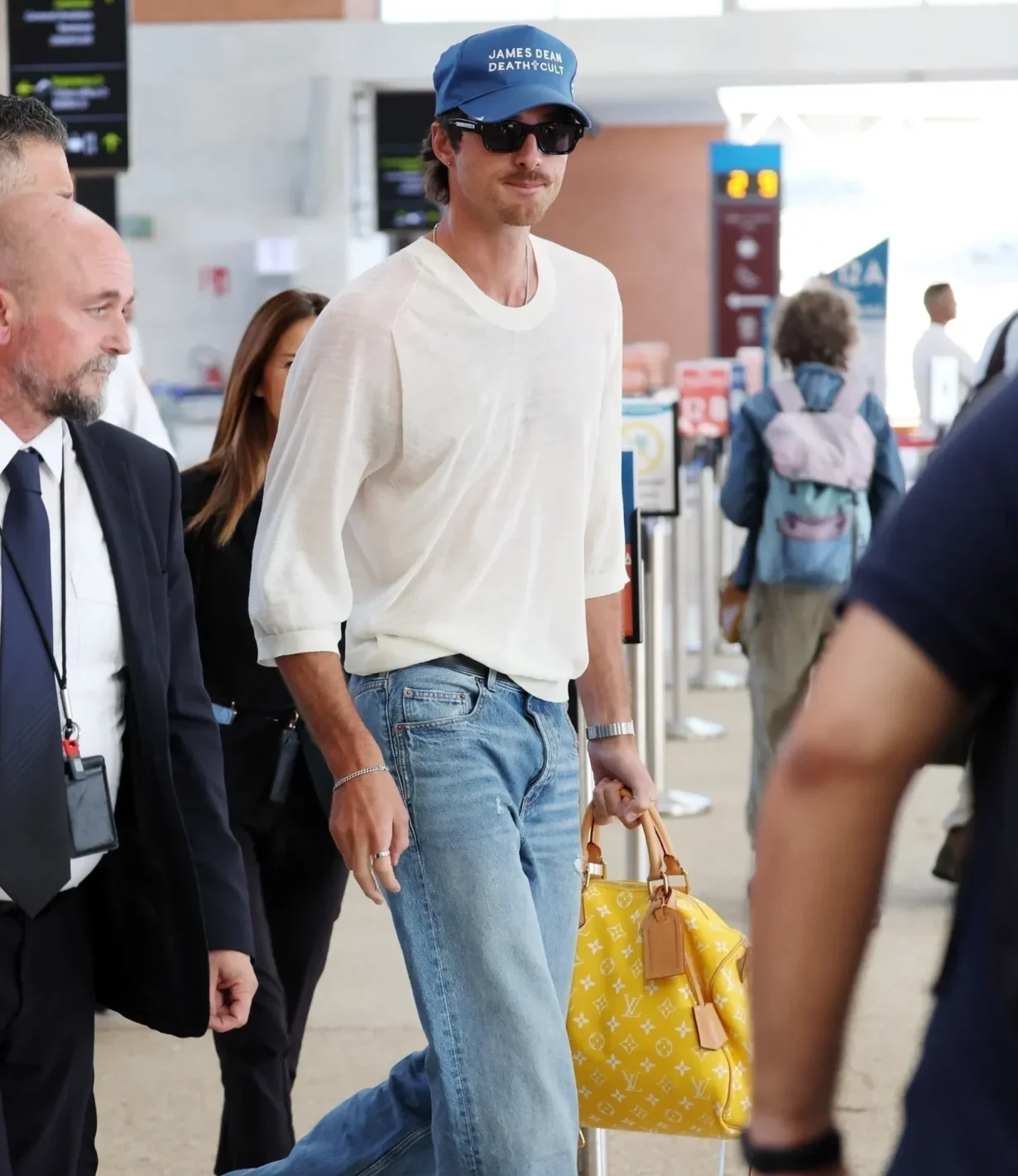 Jacob Elordi style featuring Louis Vuitton luxury bag and street fashion